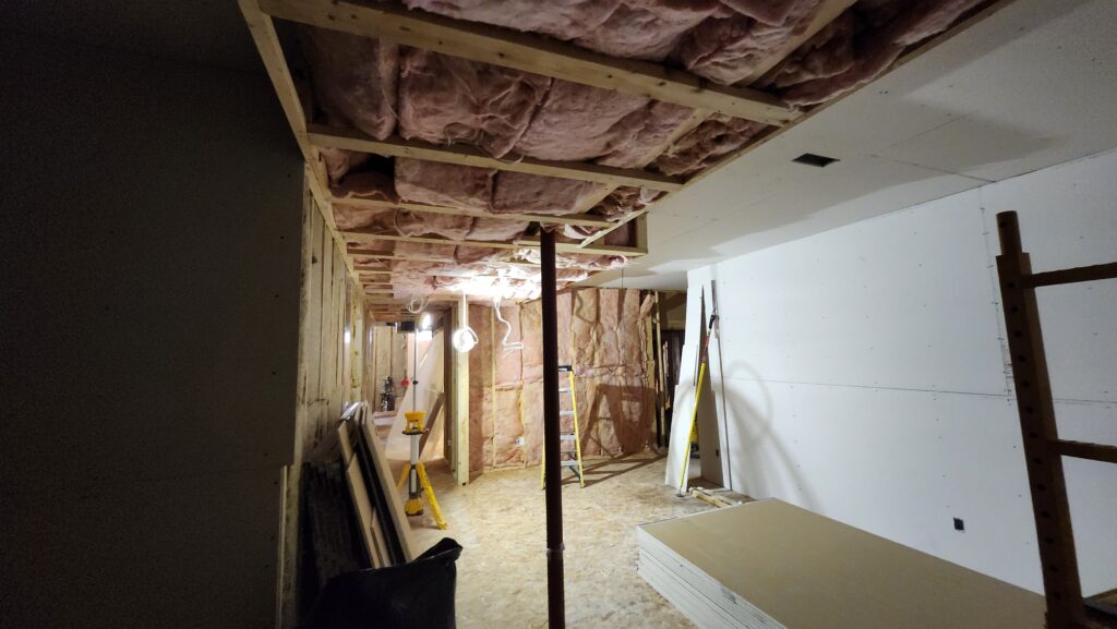 Ancaster basement with insulation and drywall installation underway
