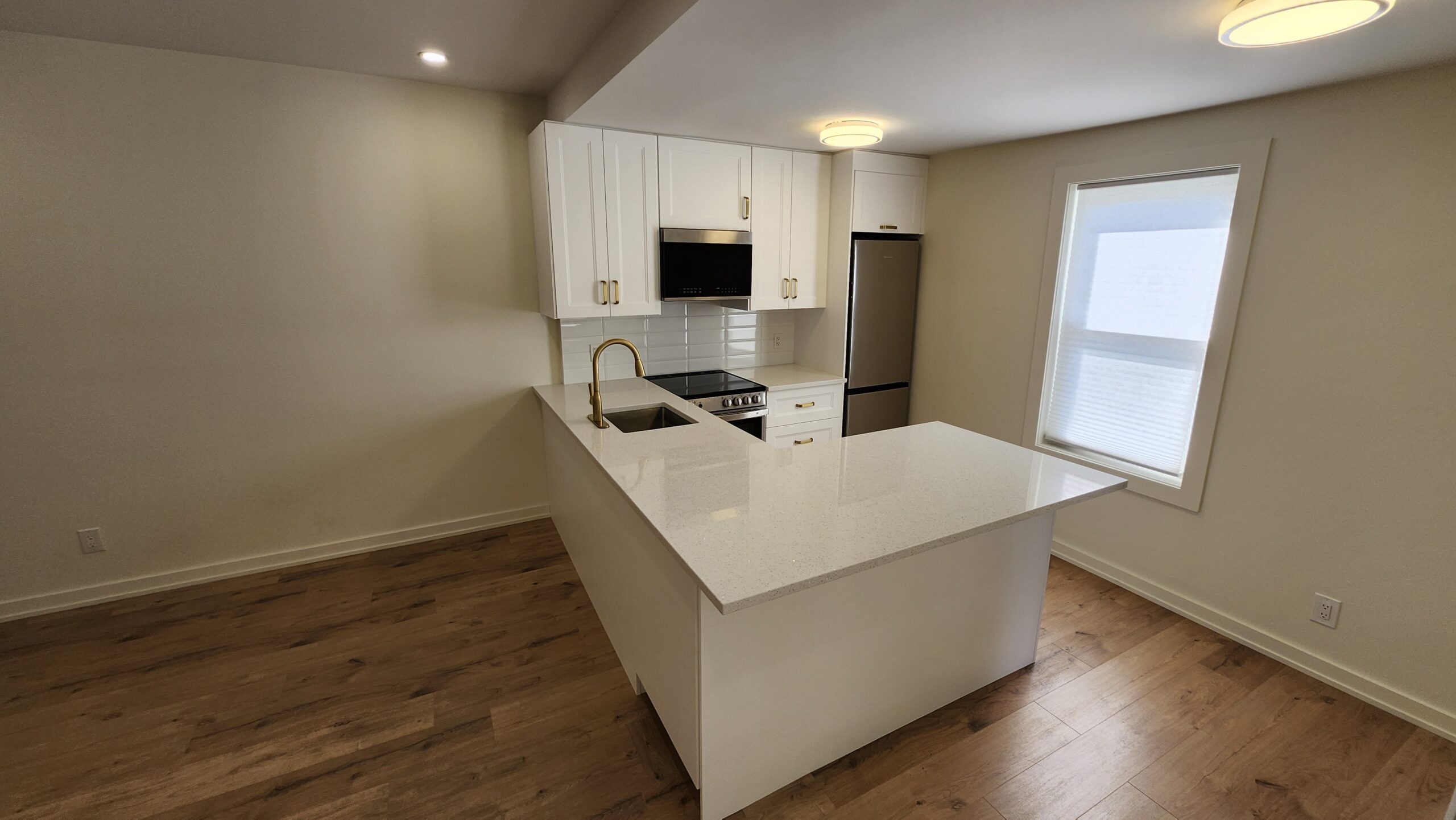 Completed kitchen install after bearing wall removal