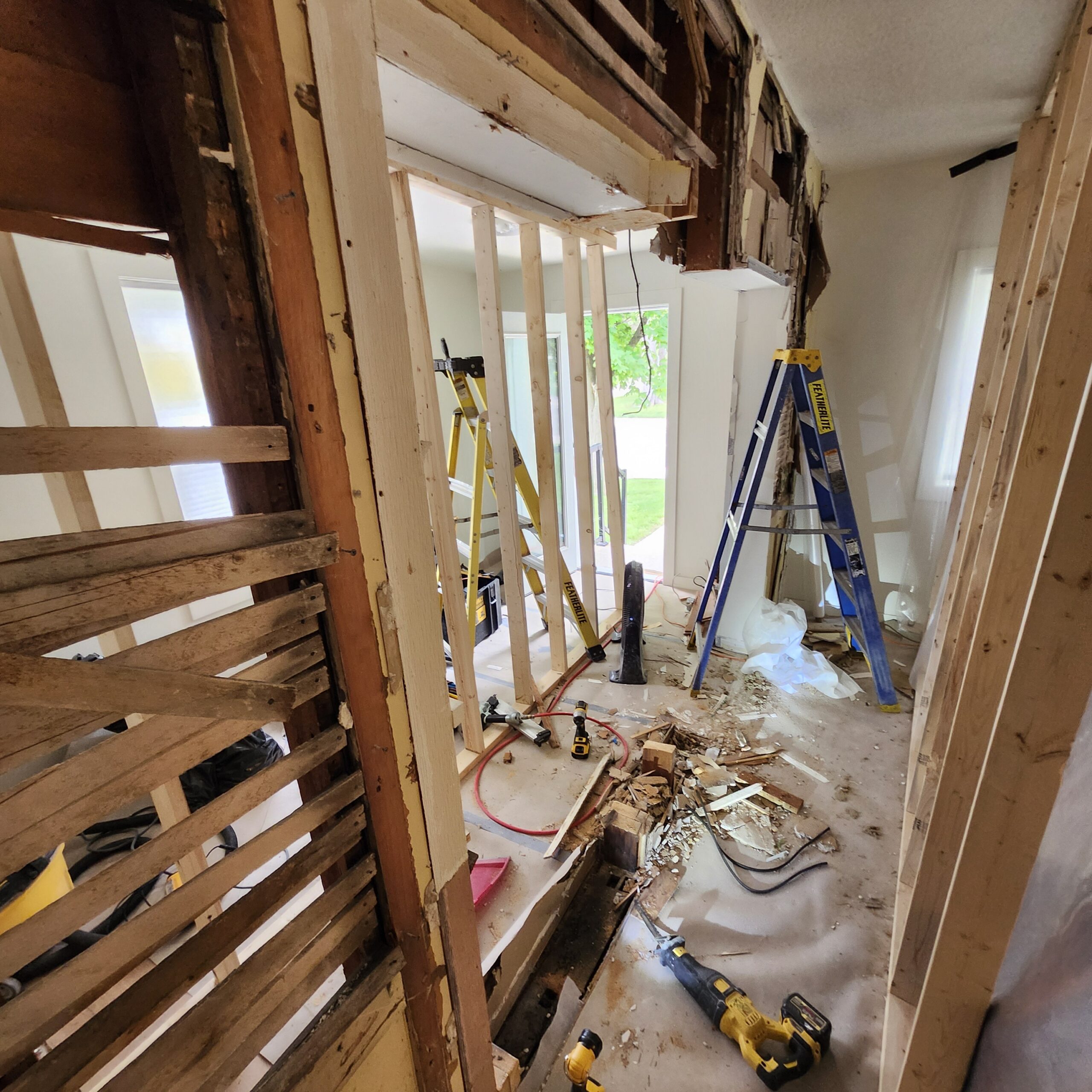 Temporary support for load-bearing wall removal and beam installation