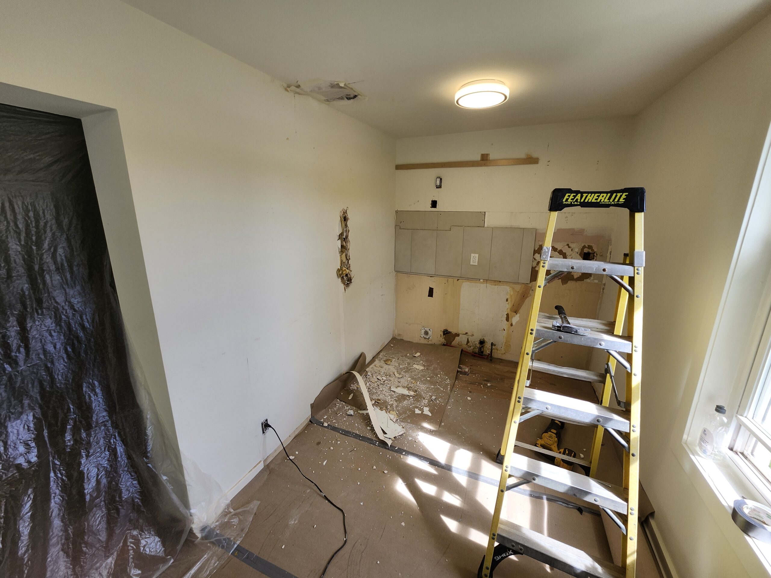 Existing kitchen after cabinet removal