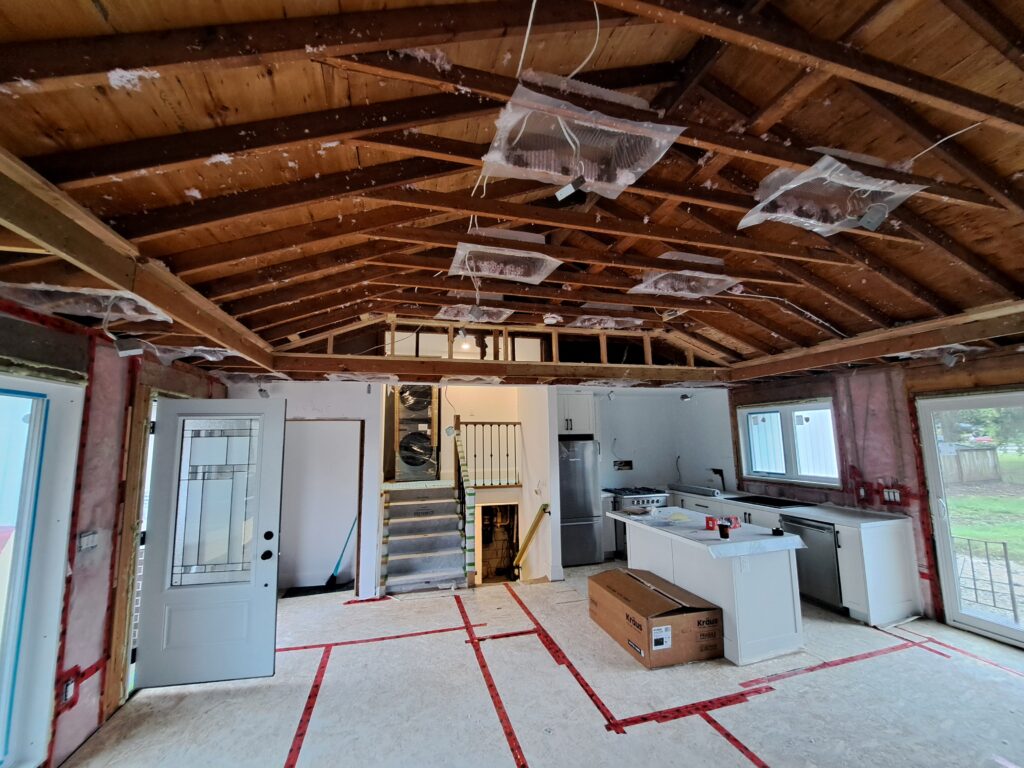 Existing Burlington kitchen after the ceiling was opened to expose the original roof framing