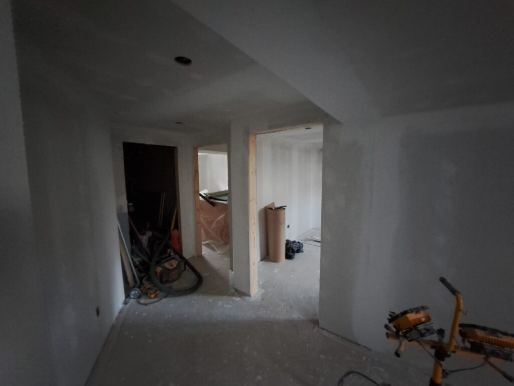Burlington Millcroft basement after drywall hanging and Level 4 finishing