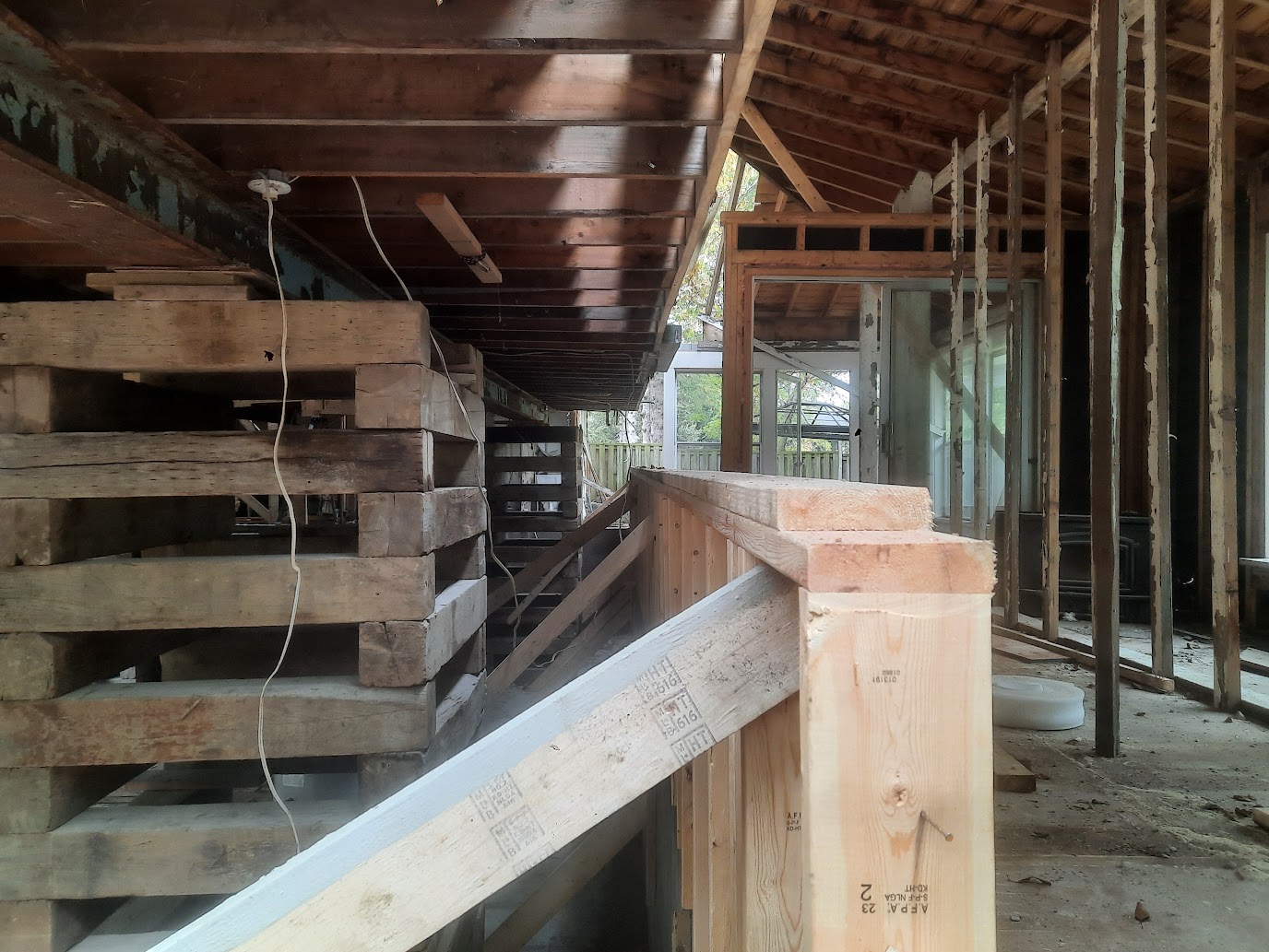 Residential steel beam installed from structural drawings