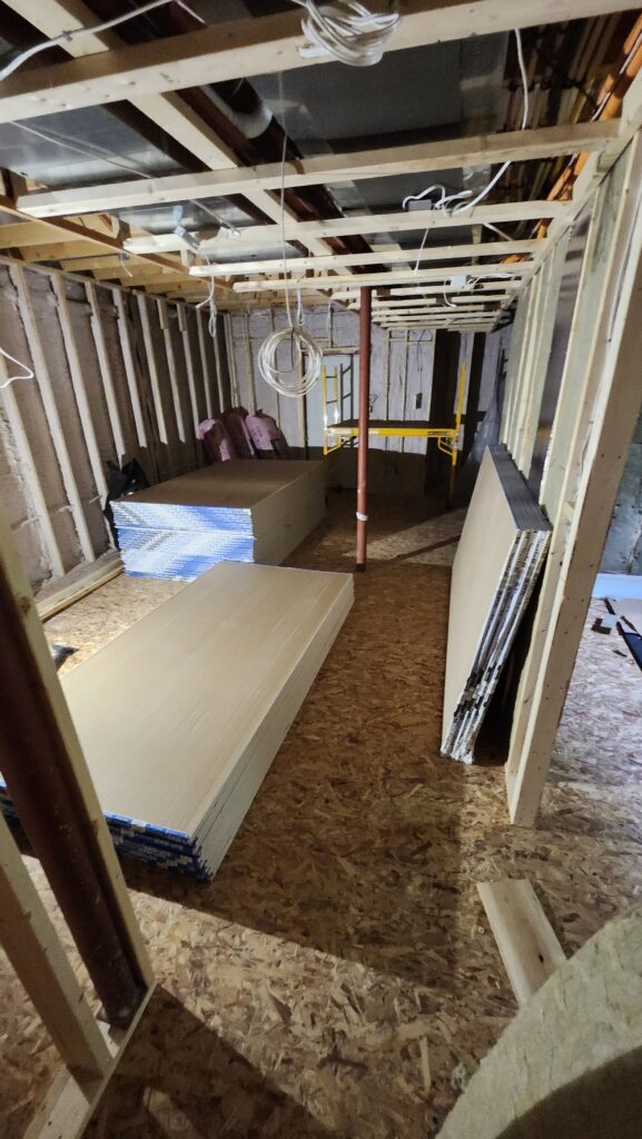 Ancaster basement framing around ceiling utilities and mechanical systems