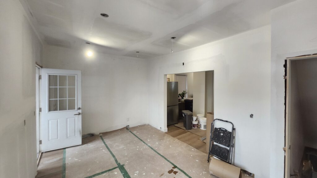 Hamilton kitchen after drywall hanging and finishing before cabinet installation