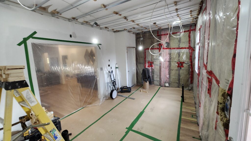 Protected Hamilton kitchen work area before ceiling drywall installation